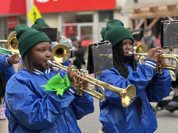 Student trumpeters perform at the parade.